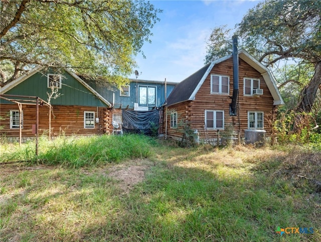 back of property with cooling unit