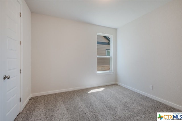 view of carpeted spare room