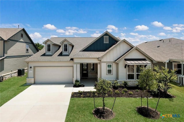 11305 Hollering Pass, Schertz, TX 78154 - view of front facade with board and batten siding, an attached garage, roof with shingles, and a front yard