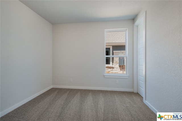 view of carpeted spare room