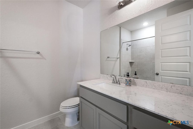 11305 Hollering Pass, Schertz, TX 78154 - bathroom featuring vanity, tile patterned flooring, and a tile shower