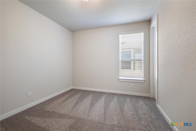 11305 Hollering Pass, Schertz, TX 78154 - carpeted empty room with baseboards
