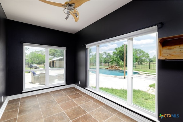 12011 Fm 1150, Luling, TX 78648 - unfurnished room with ceiling fan and light tile patterned floors