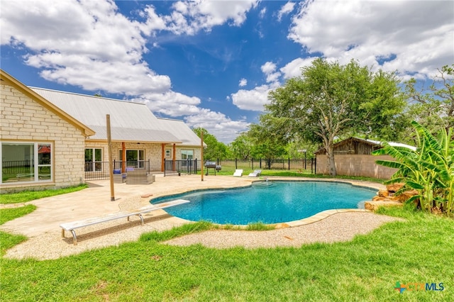 12011 Fm 1150, Luling, TX 78648 - view of pool featuring a patio, a diving board, and a fenced backyard