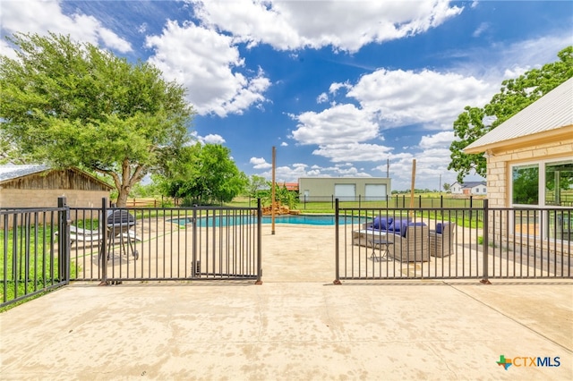 12011 Fm 1150, Luling, TX 78648 - view of swimming pool with a patio and an outdoor structure