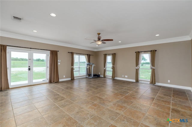 12011 Fm 1150, Luling, TX 78648 - spare room featuring plenty of natural light, ceiling fan, crown molding, french doors, and recessed lighting