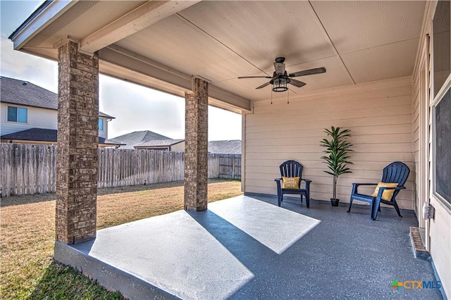 view of patio / terrace with ceiling fan and a fenced backyard