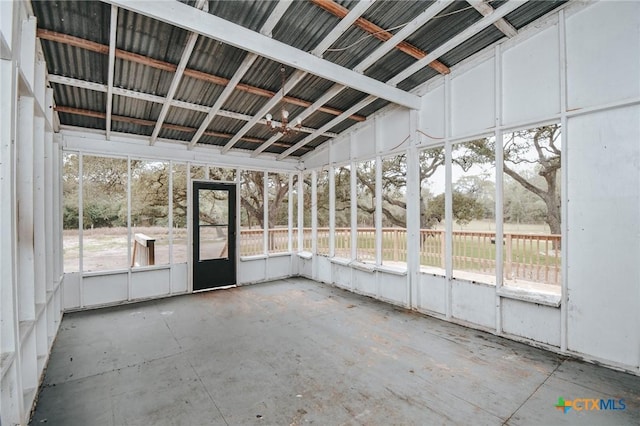 unfurnished sunroom featuring plenty of natural light