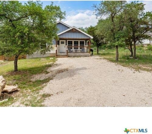 2319 Westview Dr, Canyon Lake, TX 78133 - view of front of house with driveway and covered porch