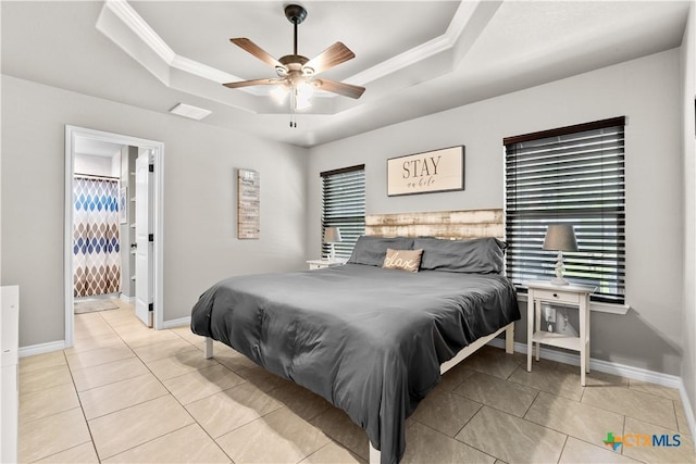 2319 Westview Dr, Canyon Lake, TX 78133 - tiled bedroom with crown molding, multiple windows, and a raised ceiling