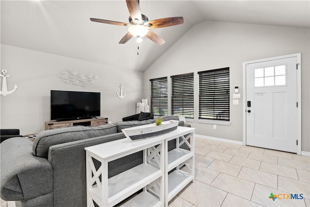 2319 Westview Dr, Canyon Lake, TX 78133 - living room with high vaulted ceiling, baseboards, ceiling fan, and light tile patterned floors
