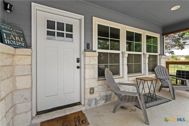 2319 Westview Dr, Canyon Lake, TX 78133 - entrance to property with a porch and stone siding