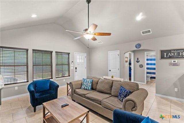 2319 Westview Dr, Canyon Lake, TX 78133 - living room with ceiling fan, arched walkways, visible vents, and light tile patterned floors