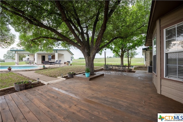 deck featuring central AC unit