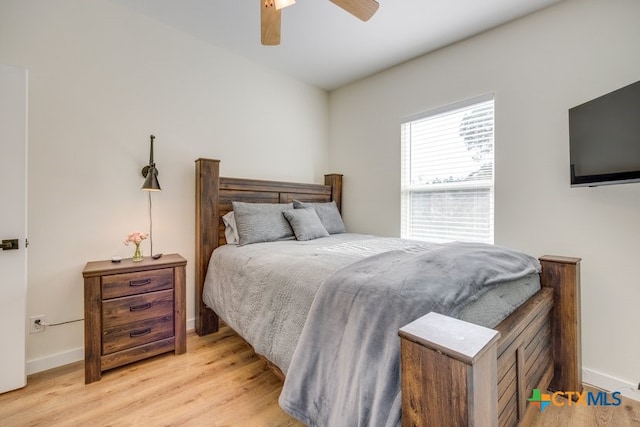 482 Dusty Saddle, Canyon Lake, TX 78133 - bedroom featuring light wood-style flooring and ceiling fan