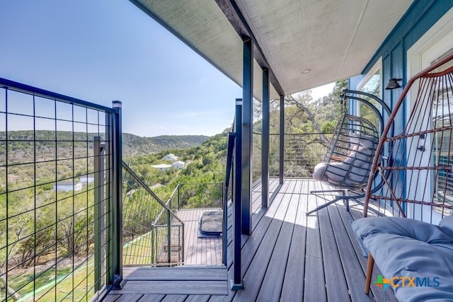 482 Dusty Saddle, Canyon Lake, TX 78133 - wooden terrace featuring a mountain view