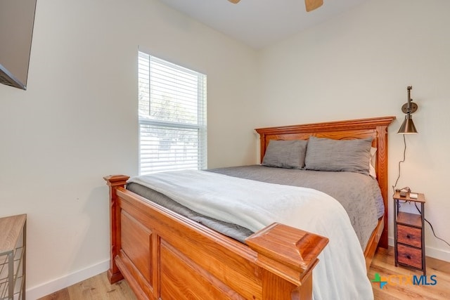 482 Dusty Saddle, Canyon Lake, TX 78133 - bedroom with light wood-type flooring and ceiling fan