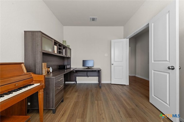 1044 Shelby Dr, Belton, TX 76513 - office featuring dark wood-style floors, visible vents, and baseboards