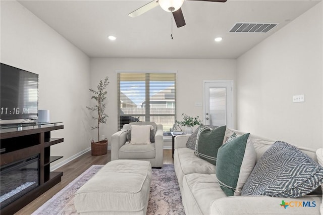 1044 Shelby Dr, Belton, TX 76513 - living room featuring visible vents, baseboards, recessed lighting, wood finished floors, and a ceiling fan