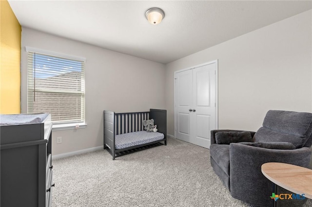 1044 Shelby Dr, Belton, TX 76513 - bedroom with light colored carpet, a closet, and baseboards