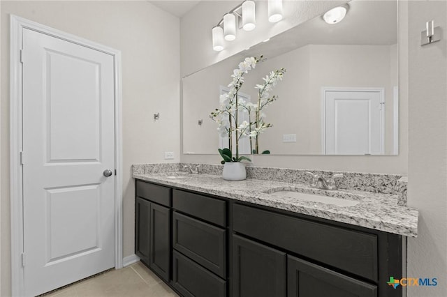 1044 Shelby Dr, Belton, TX 76513 - full bath featuring double vanity, tile patterned flooring, and a sink