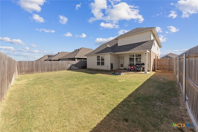 1044 Shelby Dr, Belton, TX 76513 - back of house featuring a yard, a fenced backyard, and roof with shingles