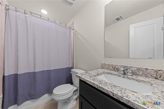 1044 Shelby Dr, Belton, TX 76513 - bathroom with tile patterned flooring, visible vents, toilet, and vanity