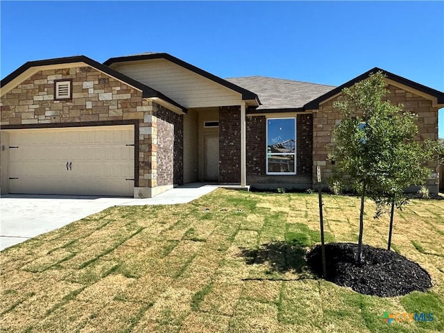 ranch-style home with an attached garage, a front yard, concrete driveway, and brick siding