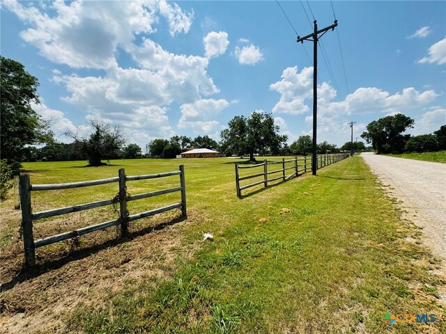 exterior space with a rural view