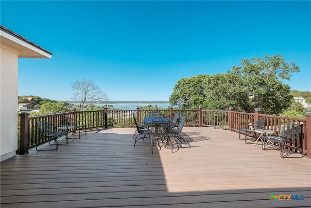 115 Scarlet Ct, Canyon Lake, TX 78133 - deck featuring outdoor dining space and a water view