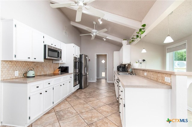 812 Trail Crest Dr, Harker Heights, TX 76548 - kitchen featuring a ceiling fan, tasteful backsplash, a sink, vaulted ceiling with beams, and stainless steel appliances