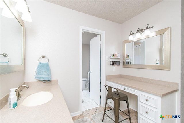 812 Trail Crest Dr, Harker Heights, TX 76548 - bathroom featuring vanity, a textured ceiling, and toilet