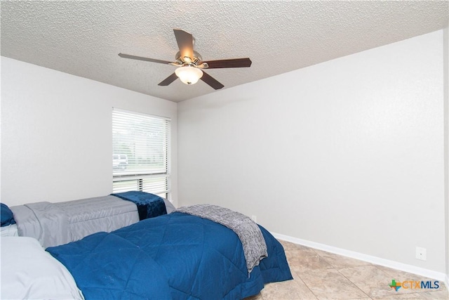 812 Trail Crest Dr, Harker Heights, TX 76548 - bedroom with a textured ceiling and ceiling fan