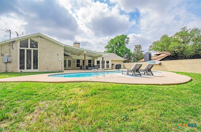 812 Trail Crest Dr, Harker Heights, TX 76548 - view of swimming pool with a lawn, a fenced in pool, a ceiling fan, and a patio area