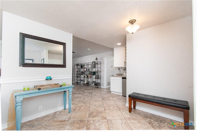 812 Trail Crest Dr, Harker Heights, TX 76548 - corridor with recessed lighting, a textured ceiling, and baseboards