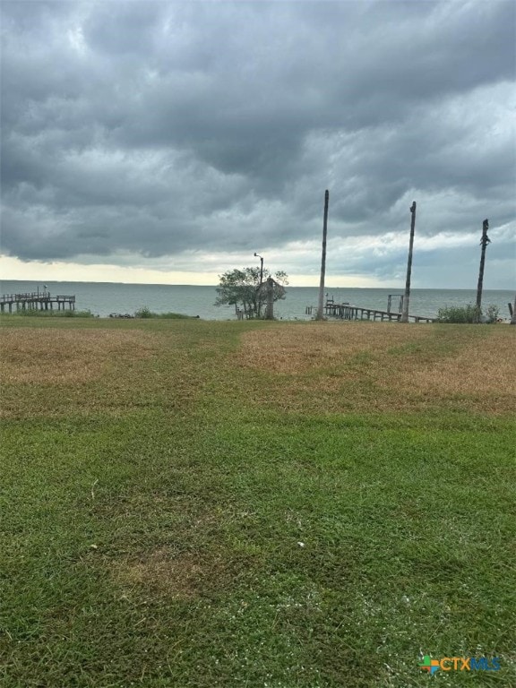93 Sandcastle Dr, Port Lavaca, TX 77979 - view of yard featuring a water view