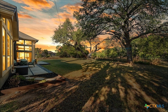 465 Linden Loop, Driftwood, TX 78619 - view of grassy yard featuring a patio