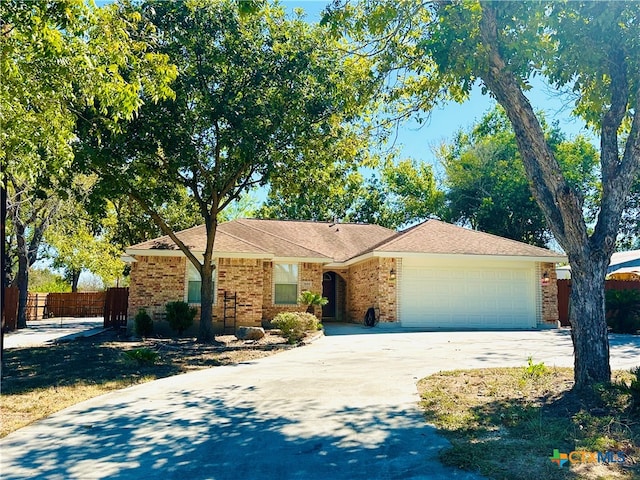 ranch-style home with a garage