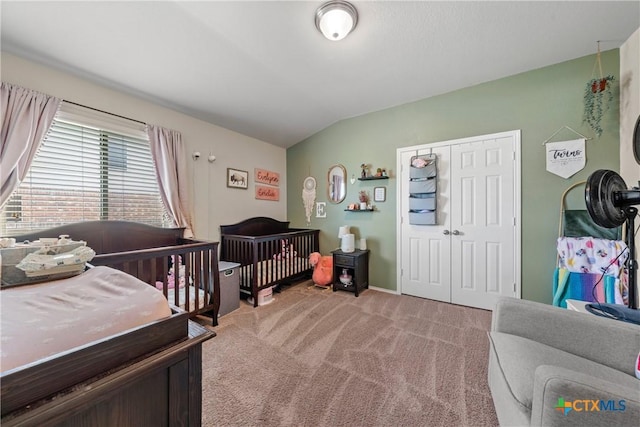 406 Coby, Troy, TX 76579 - bedroom with light colored carpet, a closet, and a crib