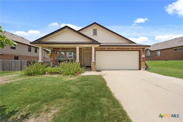 406 Coby, Troy, TX 76579 - craftsman inspired home featuring brick siding, an attached garage, driveway, and covered porch