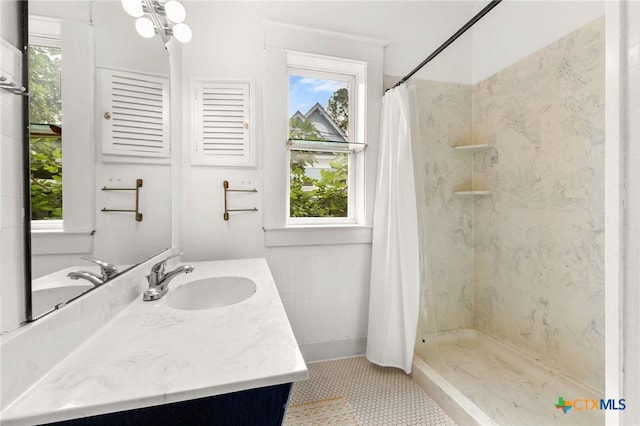 216 E Cedar St, Seguin, TX 78155 - bathroom featuring plenty of natural light, vanity, and a shower with shower curtain