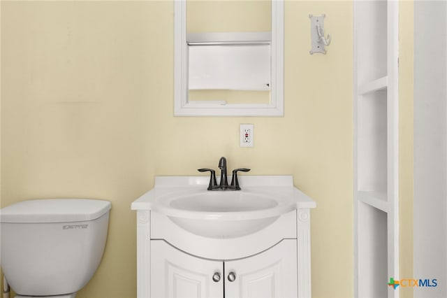 216 E Cedar St, Seguin, TX 78155 - bathroom with vanity and toilet