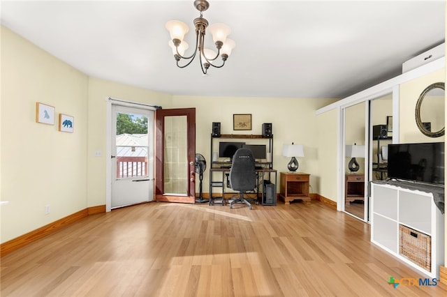 216 E Cedar St, Seguin, TX 78155 - office area featuring light wood-style flooring, a chandelier, and baseboards
