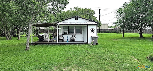 view of outdoor structure featuring fence