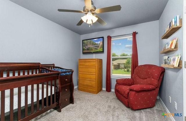 832 Paseo Del Plata, Temple, TX 76502 - carpeted bedroom with a crib and a ceiling fan