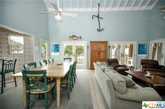 dining space with a healthy amount of sunlight and french doors