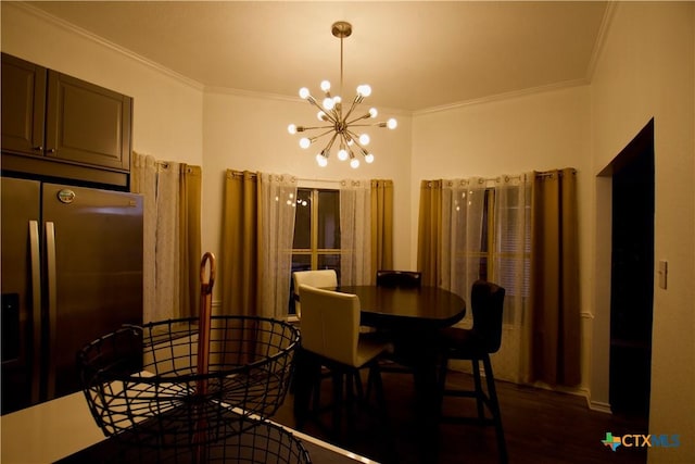 dining room featuring crown molding and a chandelier