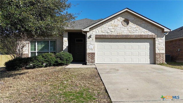 ranch-style home featuring a garage, brick siding, concrete driveway, and roof with shingles