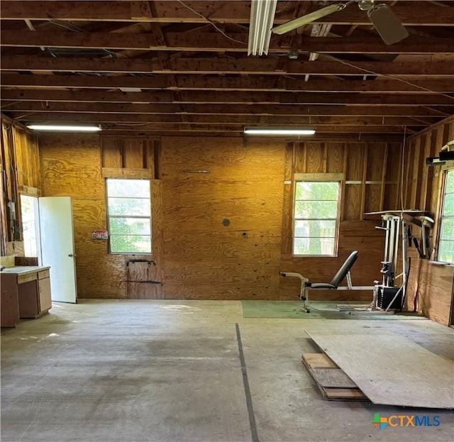 110 Edinburgh St, Victoria, TX 77904 - miscellaneous room with plenty of natural light and wooden walls