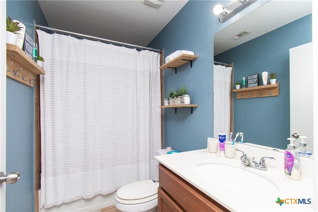 2324 Bellmont, Temple, TX 76504 - bathroom featuring toilet, vanity, and shower / tub combo